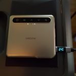 Aurzen ZIP Tri-Fold DLP Truly Mini Projector. Pocket Size. Zero-Lag Focus. One-Click Screen Mirroring. Full-Screen Mode. Type-C Fast Charging. 5.000mAh Battery. Indoor Outdoor Portable Projector.Gold photo review