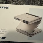 Aurzen ZIP Tri-Fold DLP Truly Mini Projector. Pocket Size. Zero-Lag Focus. One-Click Screen Mirroring. Full-Screen Mode. Type-C Fast Charging. 5.000mAh Battery. Indoor Outdoor Portable Projector.Gold photo review