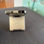 Aurzen ZIP Tri-Fold DLP Truly Mini Projector. Pocket Size. Zero-Lag Focus. One-Click Screen Mirroring. Full-Screen Mode. Type-C Fast Charging. 5.000mAh Battery. Indoor Outdoor Portable Projector.Gold photo review